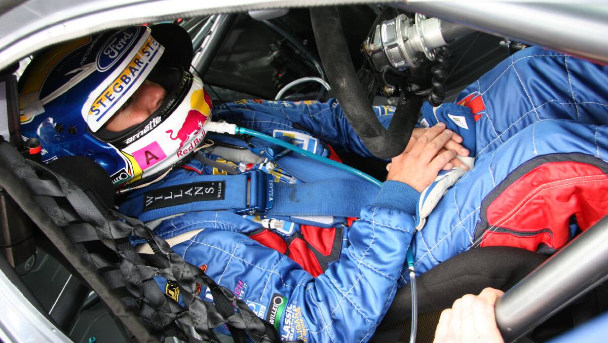 FLASHBACK: Marcos Ambrose sits in his Ford Falcon on the grid at Mount Panorama as he awaits the start of the 2005 Bathurst 1000. He will be back at the Mount next year. Photo: PETER FORAN 	IMG_0559