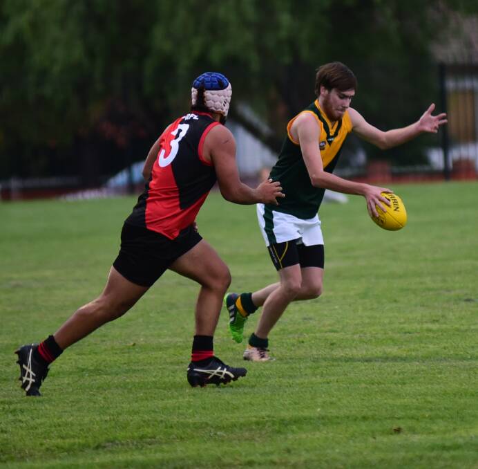 ON THE BALL: Bathurst’s Sam Kennedy gets boot to ball as he plays for the Central West representative outfit which beat Northern Riverina on Saturday. Photo: Cheryl Burke 	052316samkennedy