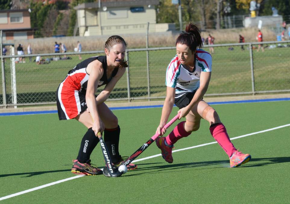 ON THE BALL: Bathurst City's Jess Hotham (right) tested out her injured back and scored a goal in her limited time on the field during her side's 4-1 win over Parkes on Saturday. Photo: PHILL MURRAY 052315pcity6