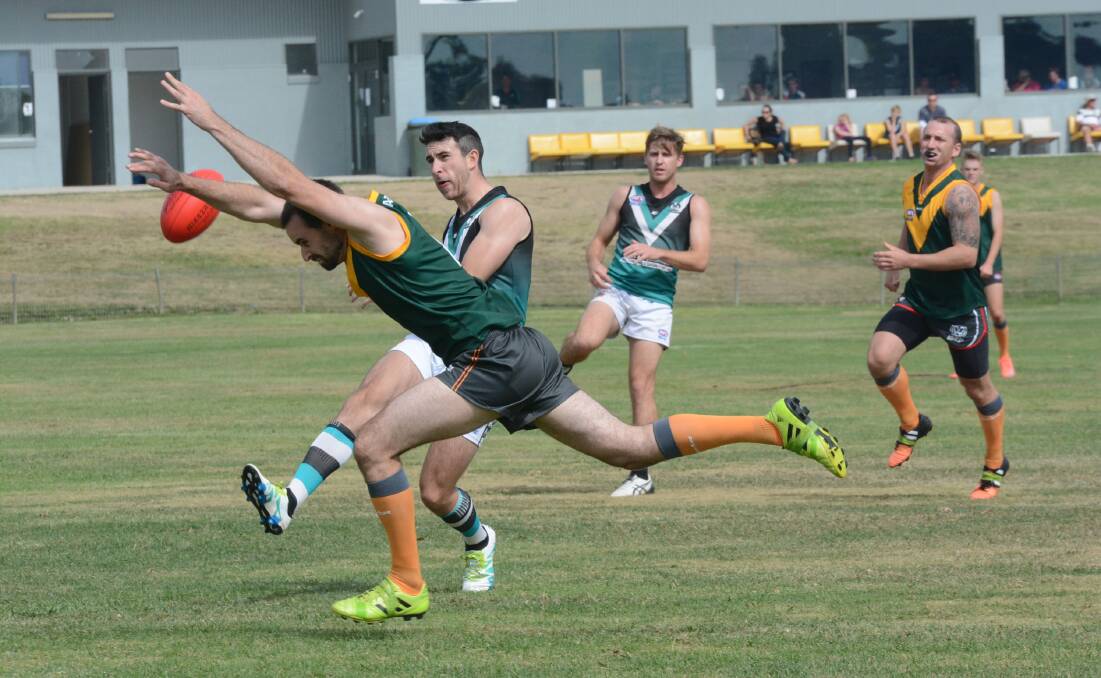 TOO STRONG: Bushrangers Outlaws forward Nathan  Swards takes a shot at goal during his team’s demolition of the Bathurst Giants on Saturday. Photo: PHILL MURRAY 	041616pafl