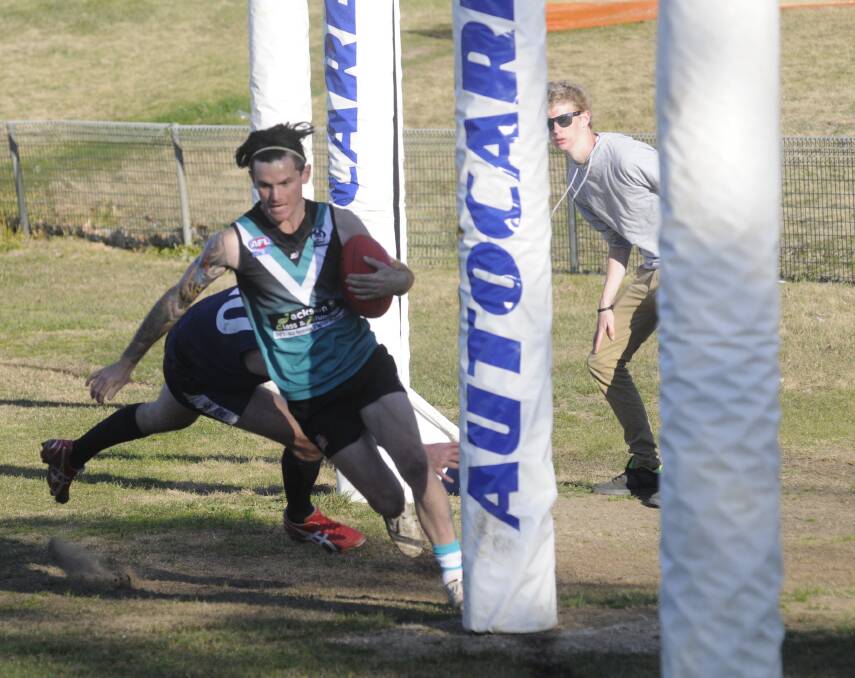 LONG LEAP AHEAD: Former Bathurst Bushranger Paul Long hasn’t wasted time making an impact in the AFL Canberra first grade competition, gaining selection to the ACT representative squad. Photo: CHRIS SEABROOK 	081515cafl2a