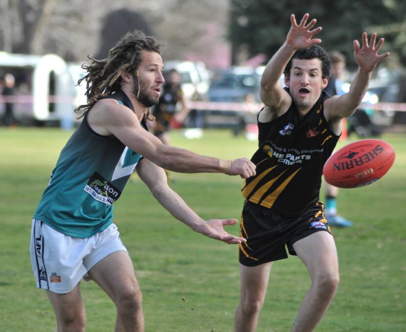 SUDDEN DEATH: Ben Horn (left) and his Bushrangers team-mates need to make sure there are no hiccups tomorrow against Cowra in order to earn a grand final spot against Orange. Photo: JUDE KEOGH 	0829afl9