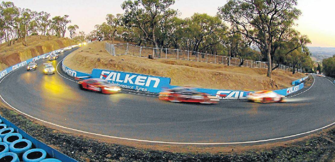 RACING ALONG: Numbers for the 2015 Bathurst 12 Hour have already topped the 2014 figure, leading to a relaxation of the grid restrictions. Photo: ZENIO LAPKA 	020914zmoly3