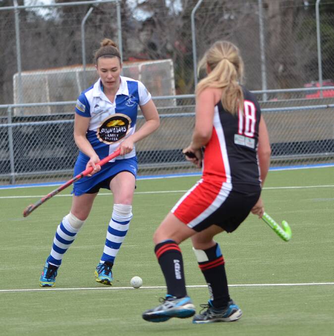 OUT OF THEIR HANDS: Amy Glenn and her St Pat’s team-mates  need results to fall dramatically in their favour if they are to have a shot at finals hockey. Photo: ANYA WHITELAW 	071914ypats8