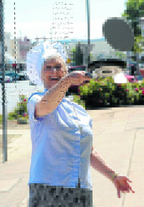 UP IN THE AIR: Dean Anne Wentzel gets ready for Bathurst’s first pancake race next Tuesday. Photo: PHILL MURRAY 	020615ppan2