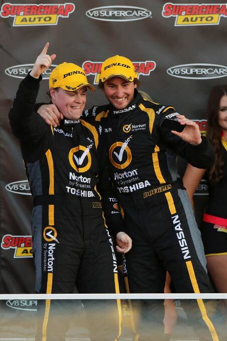 HIGHLIGHT: Taz Douglas (right) celebrates his second placing in last year’s Bathurst 1000 with James Moffat. That effort was Douglas’ first V8 podium.