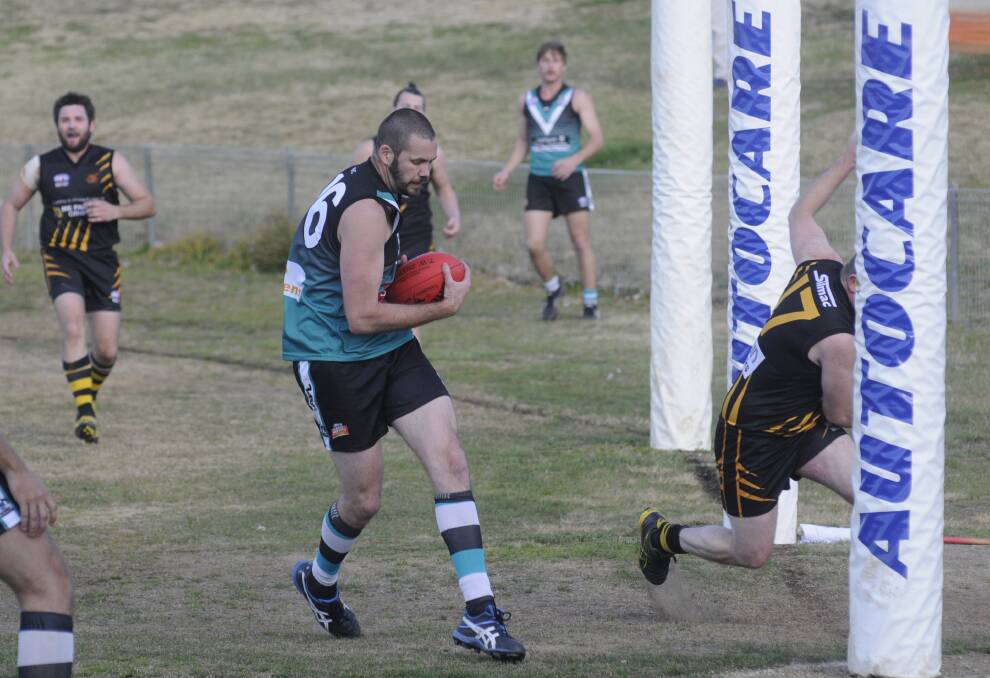 SEVEN OF THE BEST: Jordan Longmore booted seven majors for Bathurst on Saturday, but it still wasn’t enough as they lost by three points to the Orange Tigers. Photo: CHRIS SEABROOK 	082215cafl5b