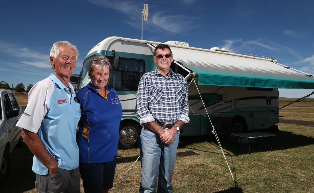 RALLYING THE TROOPS: Bathurst rally managers Col and Colleen Walker, with Keith Small, ahead of the Campervan and Motorhome Club of Australia rally at Mount Panorama later this month. Photo: PHIL BLATCH 	041116pbcmca1