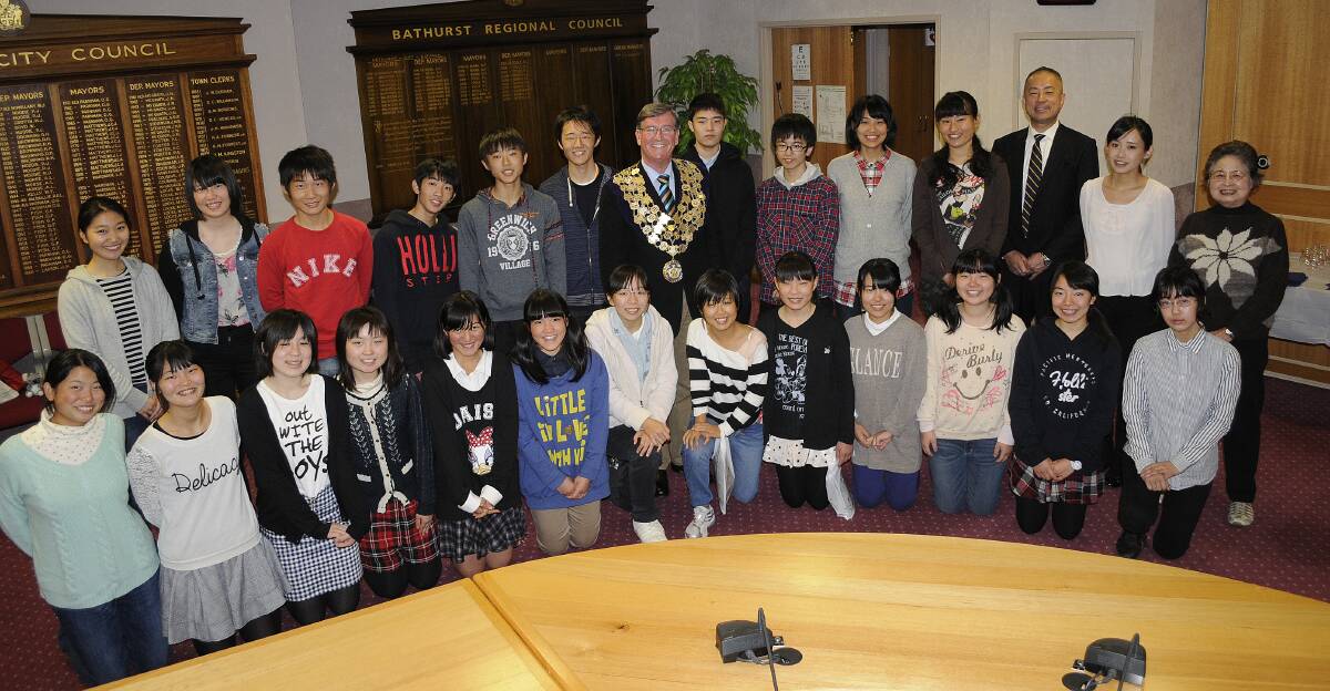WELCOME: Students from All Saints’ College’s Japanese sister city school, Yachiyo Shoin Gakuen, attended a mayoral reception on Monday afternoon. Photo: CHRIS SEABROOK	 081814crecptn1a