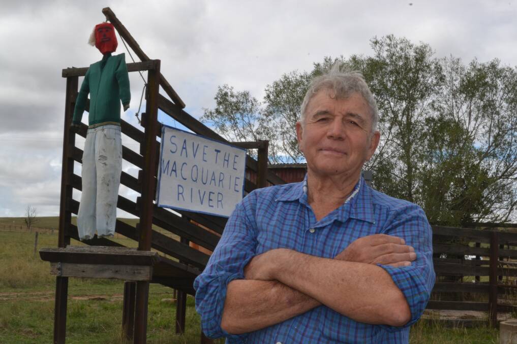NO SALE: Edwin Ryan has made his own protest against the proposed sale of waste water from Bathurst Regional Council to Regis Resources, putting up a dummy hanging from a noose on his cattle yards and a sign that says “Save the Macquarie River”. Photo: BRIAN WOOD	 020416edryan1