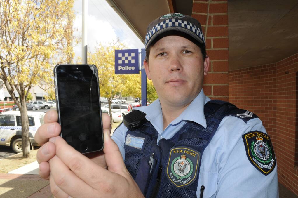 HOLD THE PHONE: Youth liaison officer Senior Constable Matt Holden. 	 031815cexting