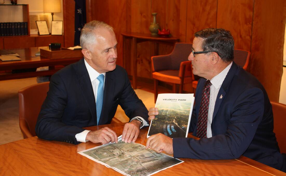 BIG VISION: Member for Calare John Cobb explains the benefits of the proposed Velocity Park at Mount Panorama to Prime Minister Malcolm Turnbull. 	041916cobbturnbull