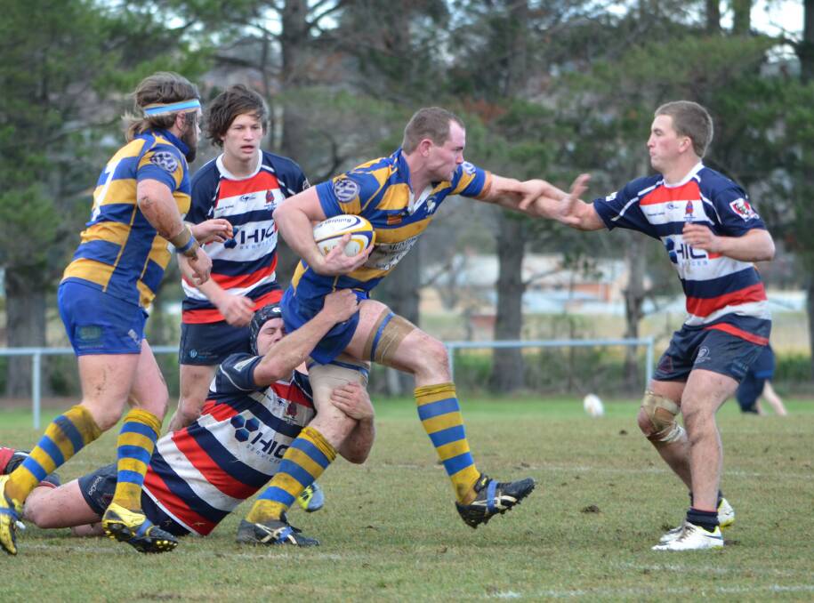 BARNSTORMING: Bulldogs number 8 Hayden Tidswell ran in three tries in Saturday's match against the Mudgee Wombats. Photo: ANYA WHITELAW 	072614ybulldogs9