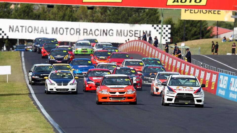 MIXED BUNCH: The NSW Production Touring Cars series will return to Mount Panorama this weekend as part of the Bathurst Motor Festival. It features a wide range of cars – from BMWs and Holden Coupes to Suzuki Swifts. Photo: NATHAN WONG 	041614bmf