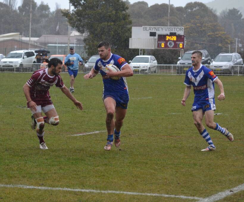 SAD AND SOAKED: The Saints’ Curtis Boardman shortly before he was brought into touch during his side’s 37-10 Group 10 premier league elimination semi-final defeat yesterday to the Blayney Bears. Photo: ALEXANDER GRANT 	082315agpats1