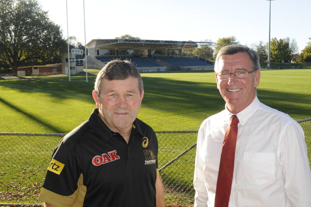READY TO RUMBLE: Penrith great Royce Simmons and Bathurst mayor Gary Rush at Carrington Park in the lead-up to tomorrow’s NRL match between Penrith and Canberra. Photo: CHRIS SEABROOK 	042716cpenpan