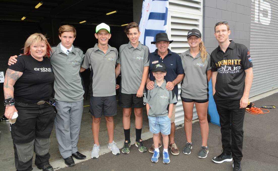 EXCITING OPPORTUNITY: Bathurst Kart Club members were able to take a look around the Erebus Motorsport garage yesterday. Erebus owner Betty Klimenko, Connor Lavelle, Charlie Dunbar, Darcy Inwood, Bathurst Kart Club president Mark Dunbar, Max Hemsworth, Tillie Dunbar and Erebus driver Dave Reynolds enjoyed the get-together. Photo: PHILL MURRAY 	020416pgokart