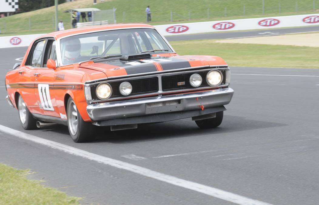 PLAYING AT HOME: Bathurst driver Michael Anderson guides his Ford XY 351GT Falcon up Pit Straight from Murrays Corner. He will contest the three Group N Historic Touring Cars races being held as part of the Bathurst Motor Festival. Photo: CHRIS SEABROOK 	040812cgroupn1