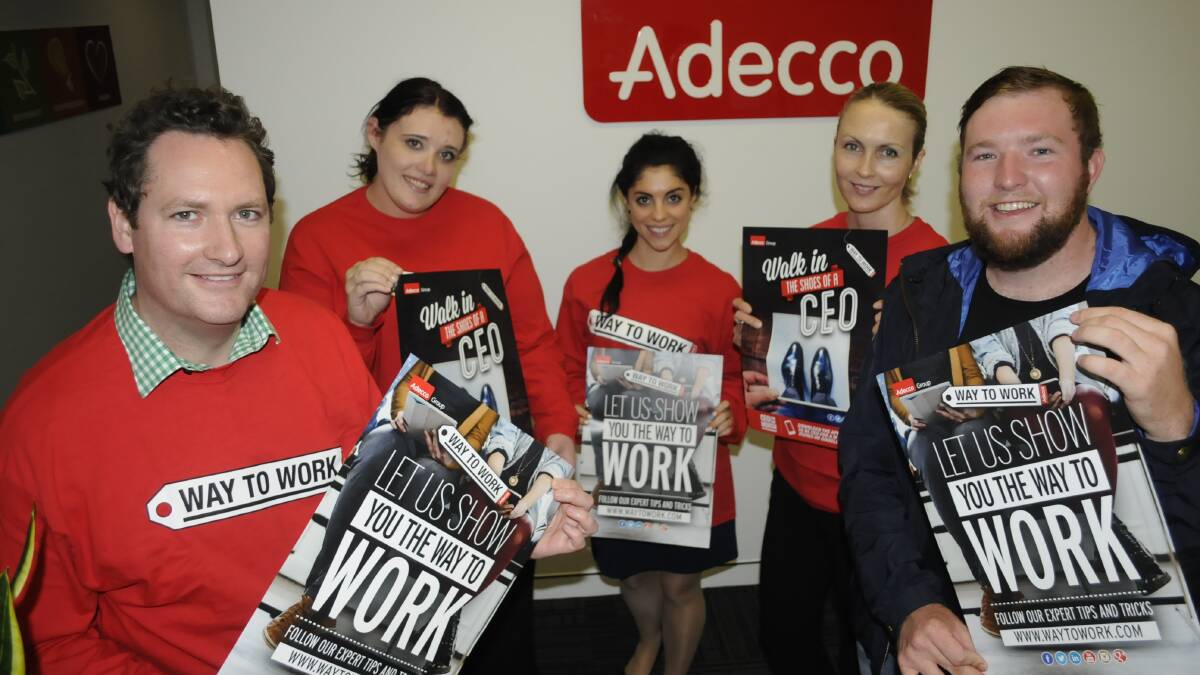 WAY TO GO: Adecco branch manager Mark Galbraith, staff Sam Tilley, Kristen Fielding, Kym Hilliard and CSU Adecco intern student Tim Lawrence say tomorrow’s Way to Work session will help get the region’s tertiary students job ready. Photo: CHRIS SEABROOK  032415cadecco