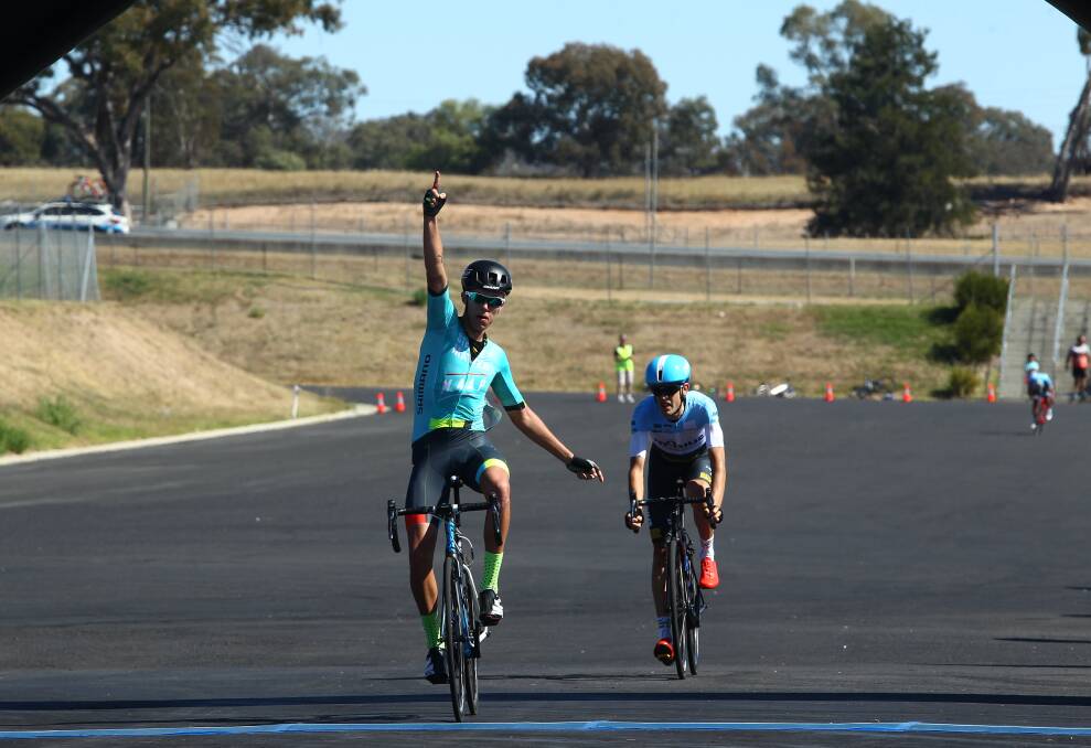 NUMBER ONE: Dylan Sunderland celebrates his win in yesterday’s Blayney to Bathurst long course over Ben Dyball. Photo: PHIL BLATCH	 041016pbb2b14