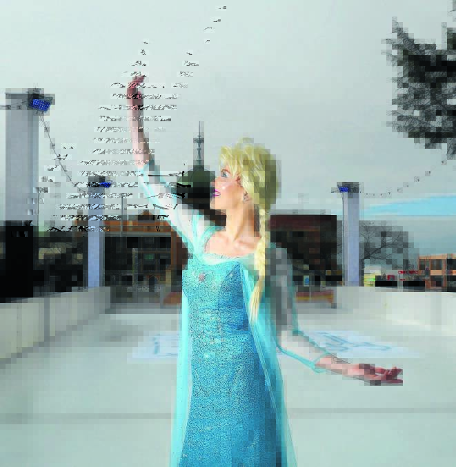 WINTER IS COMING: Snow Queen Emily Rogers from Princess Party Bathurst was testing her skating skills on the ice rink in Kings Parade yesterday ahead of this weekend’s Illuminate Bathurst Winter Festival. Photo: PHIL BLATCH 0M5A3540