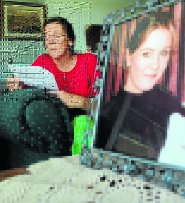 THE FINAL INSULT: Jessica Small’s mother Ricki reads through a letter from Police Minister Stuart Ayres confirming a $100,000 reward would be offered for information leading to a conviction in the 17-year mystery of her daughter’s abduction and murder. Photo: CHRIS SEABROOK	 112614cjess2