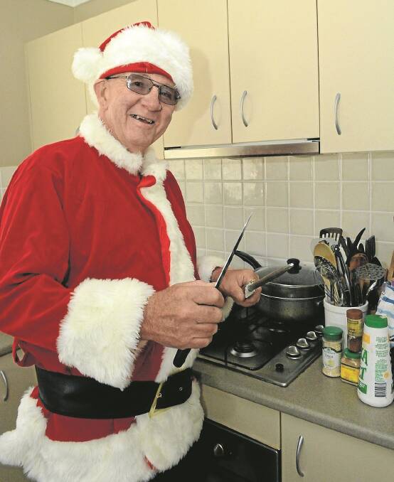 CHRISTMAS SPIRIT: Barney Rumble once again hosted his Christmas lunch this year for those who were alone or lonely. Photo: PHILL MURRAY 	120215pbarny1