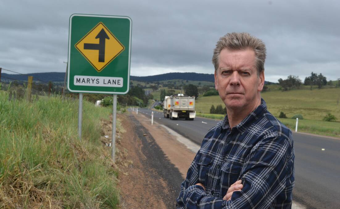 DETERMINED: Brendan McHugh’s proposed pet hotel on his property at Dunkeld is getting closer to fruition after Roads and Maritime Services signage went up letting motorists know to expect traffic to enter the Mitchell Highway from Marys Lane. Photo: BRIAN WOOD 	110515bwkennel
