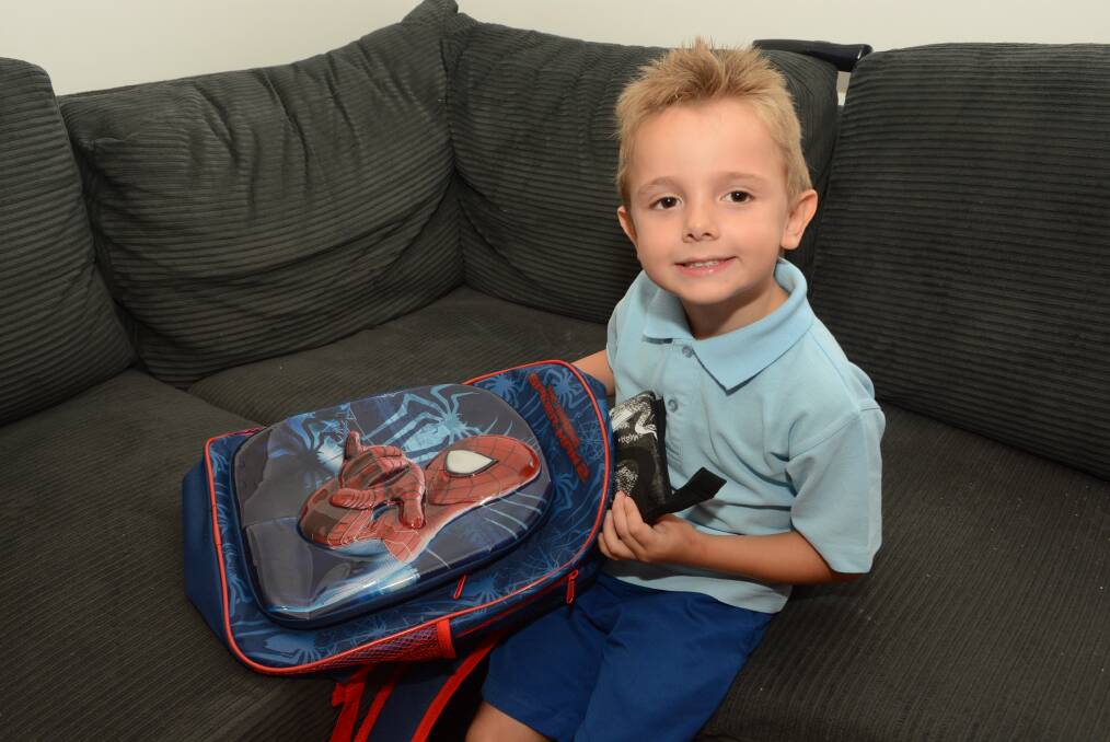 READY TO GO: Darius Debenham, 5, will start school for the first time on Friday and he’s already warned there will be tears. Photo: PHILL MURRAY  012715pdarius