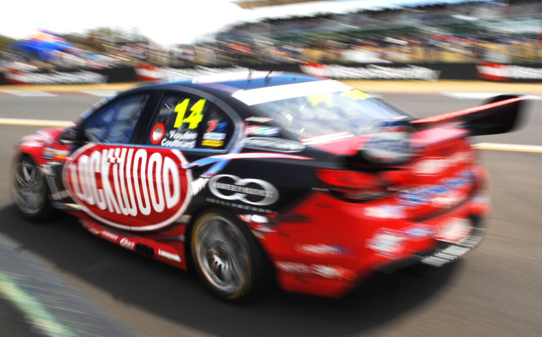 DRAMA-PACKED: Kiwi Fabian Coulthard clocked a new lap record during the 2014 Bathurst 1000, an event the fans voted as the best on the V8 Supercars calendar. Photo: ZENIO LAPKA 	101014zcoulthard4