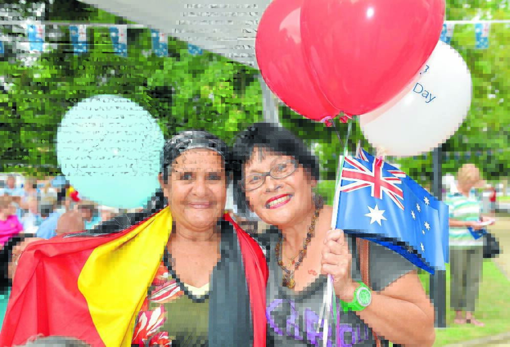 AUSTRALIANS ALL: Lonnie Edwards and Marilyn Walpole were flying the Aboriginal and Australian flags for Australia Day yesterday. Photo: ZENIO LAPKA 	ZEN_0560_552563622