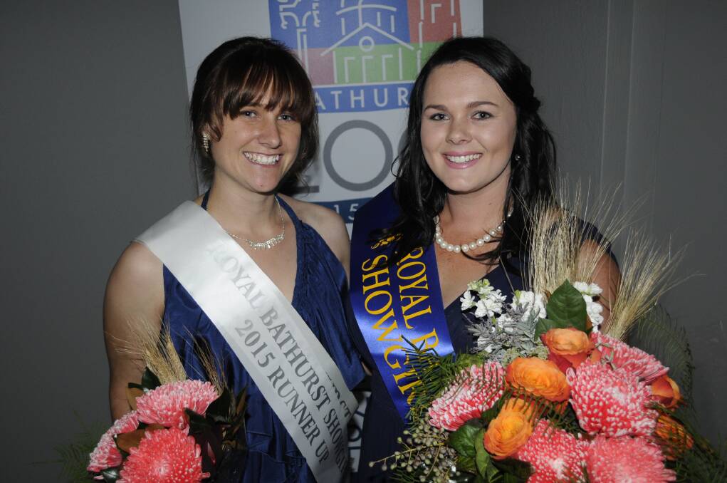 COMING UP TRUMPS: Miss Showgirl runner-up Jacinta Knight and winner Hannah Piper were crowned at a gala event on Saturday night. Photo: CHRIS SEABROOK	 041115csgirl7