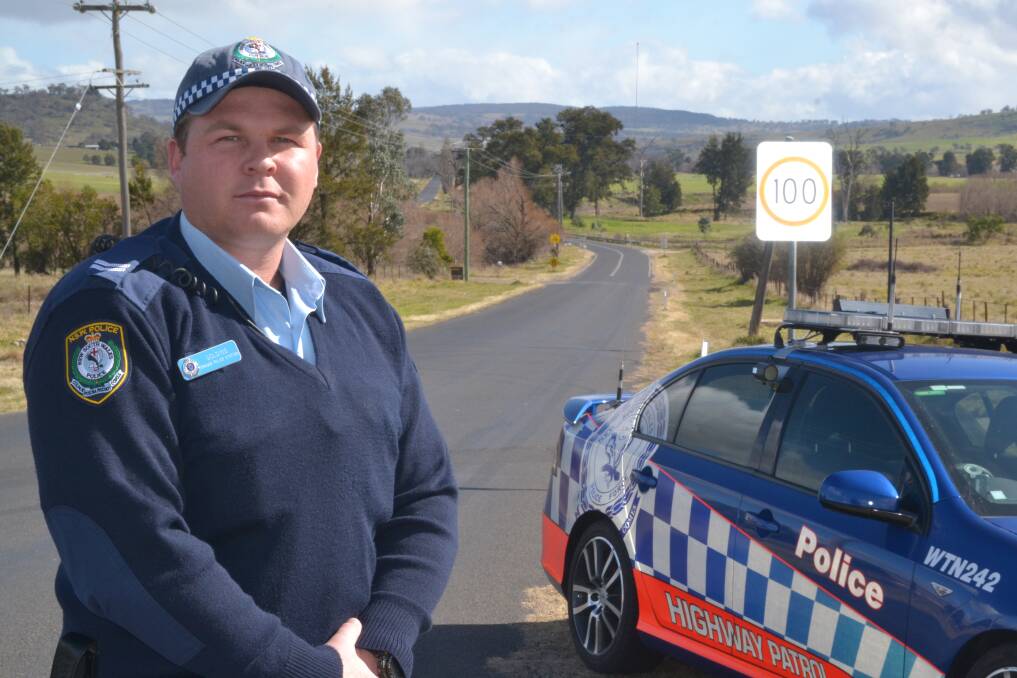 ON PATROL: Senior Constable Mick Golding from Chifley Highway Patrol says police will be looking out for speeding motorists on the Ophir Road. Photo: BRIAN WOOD	080114ophir1