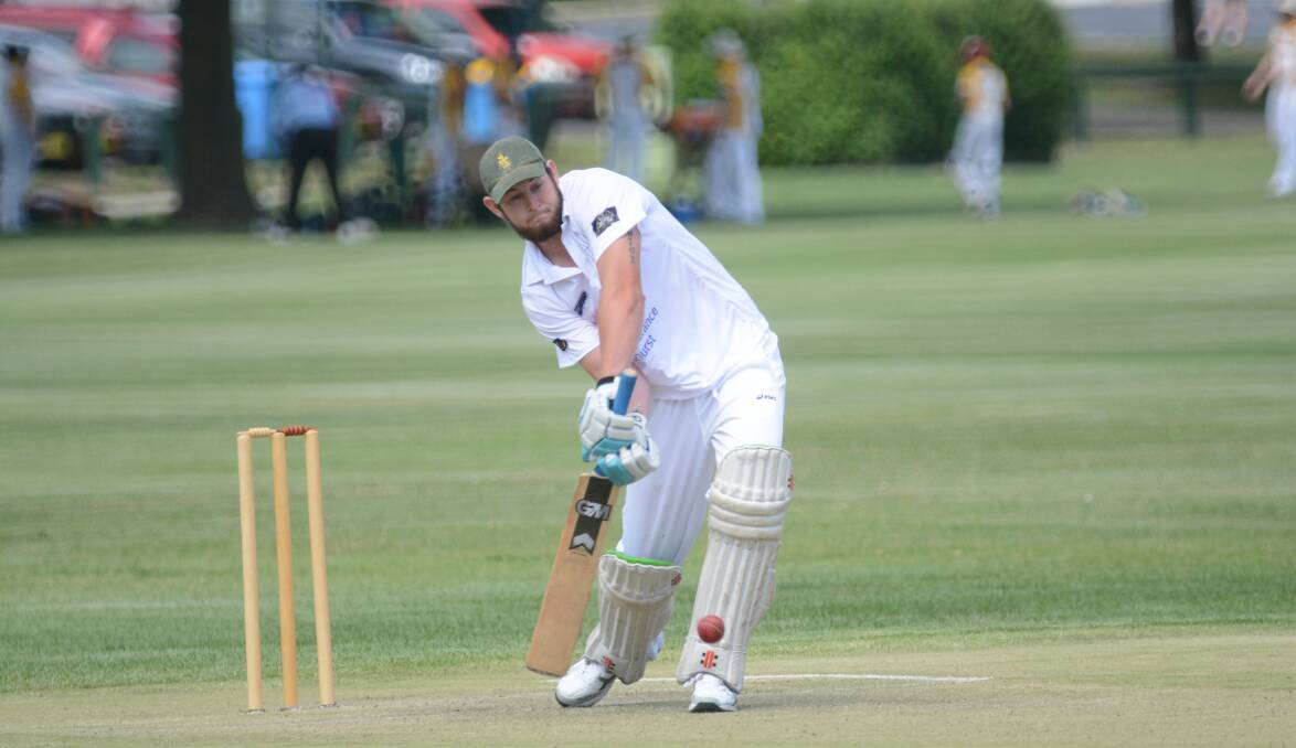 TIMELY KNOCK: Derryn Clayton has only batted twice in first grade this season, but on Saturday his second knock was crucial for St Pat’s Old Boys, making 77 in their 173 all out. Photo: PHILL MURRAY 	121314pderrin