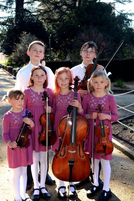MUCH TO DO: Siblings Maximilian, 11, and Elijah, 12, and (front) Kristin, 5, Josephina, 10, Kateri, 8, and Gianna, 7, have had a hectic week of 31 performances in the musical section of the Bathurst Eisteddfod. Photo: PHILL MURRAY	 082914pmusic