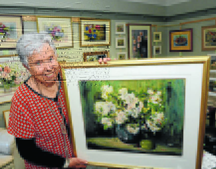 TALENT: Bathurst resident Nancy Merritt is ready to sell many of her paintings at her last home gallery day today. Photo: PHILL MURRAY	 092314pnancy