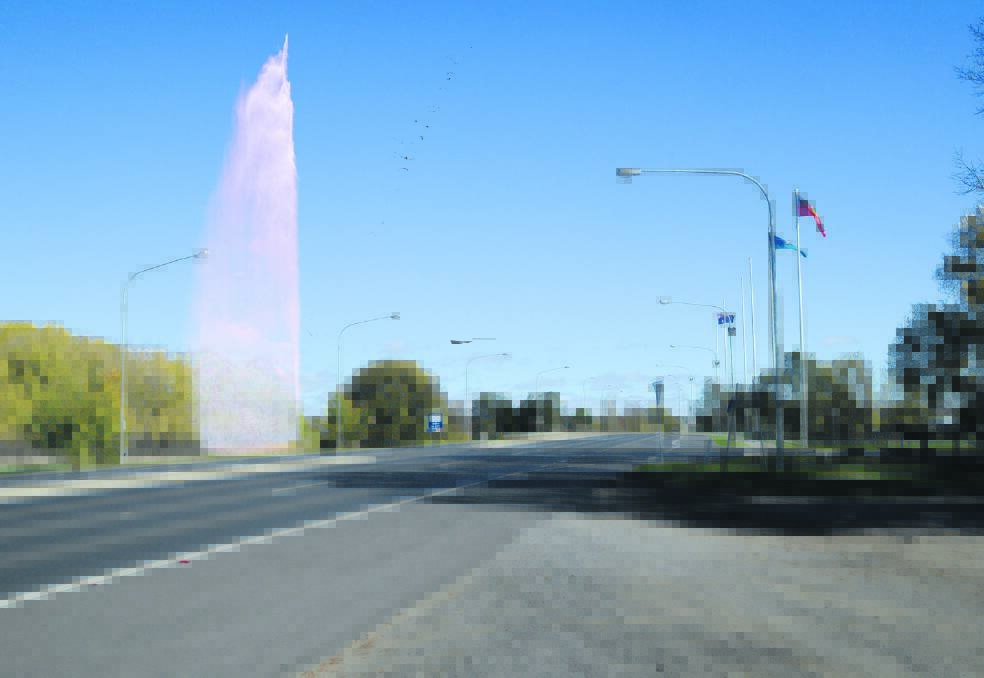 WELCOME TO BATHURST: In years to come the major gateway into Bathurst from Sydney could have a major water feature beside the Evans Bridge, like the one in this digitally enhanced image featuring the geyser-like fountain from Lake Burley Griffin in Canberra.
