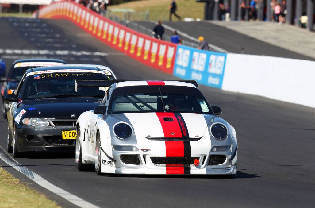 SPLIT FIELD: Porsches, Holdens and more will turn laps of the famous Mount Panorama circuit this weekend as part of two NSW Road Racing Club fields for the Bathurst Motor Festival. Photo: NATHAN WONG 	041414BMF