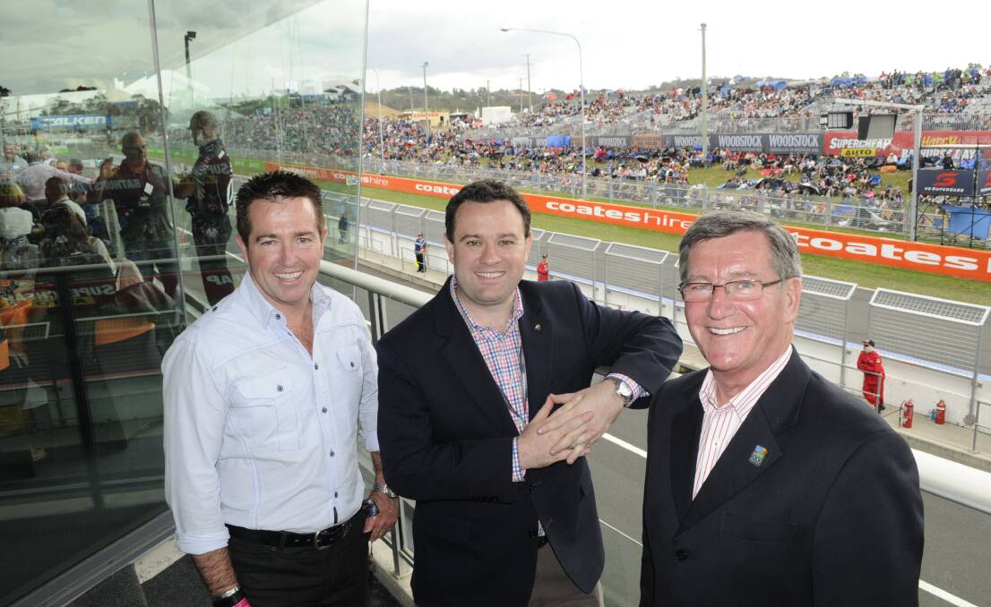 ECONOMIC BOOST: Member for Bathurst Paul Toole, NSW Tourism Minister Stuart Ayres and Bathurst mayor Gary Rush say the Great Race, despite negative comments from some Bathurstians, brings millions of dollars in economic benefits to the city. 	101115cmayorl6