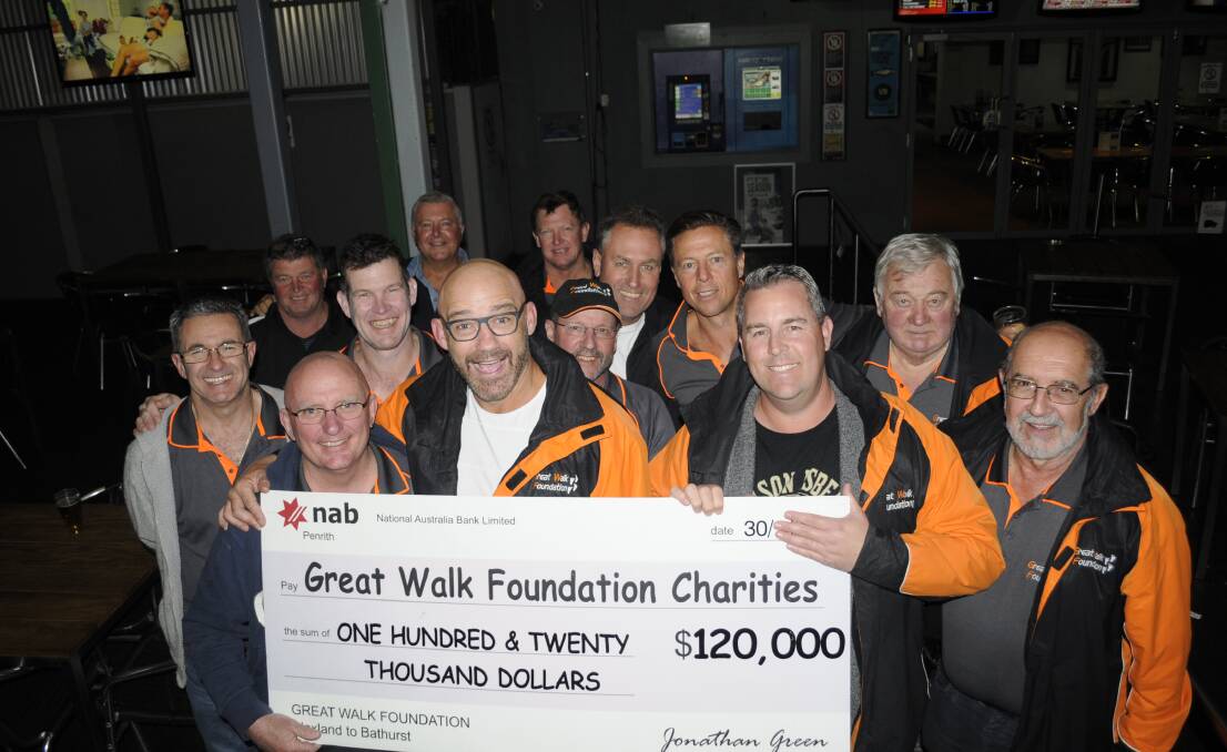 STEPPING UP: Bathurst publican Scott McAllister with league legend Mark Geyer and Trent Baker and members of the Great Walk Foundation during their stopover in Bathurst on Tuesday night. Photo: CHRIS SEABROOK	 052416cgtwalk