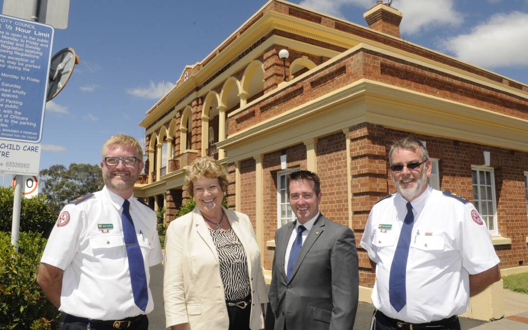 AMBULANCE UPGRADE: NSW Ambulance Central West zone manager Brad Porter, Health Minister Jillian Skinner, Member for Bathurst Paul Toole and NSW Ambulance western sector deputy director of operations John Stonestreet at yesterday’s funding announcement. Photo: CHRIS SEABROOK	 030215cambos1