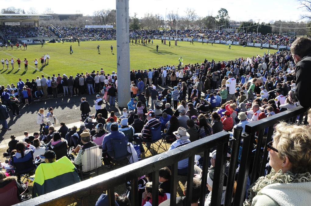 BUSINESS BOOM: The large crowd that attended the NRL match at Carrington Park on Saturday provided a big boost to local business. Photo: CHRIS SEABROOK 	072614cnrl11a