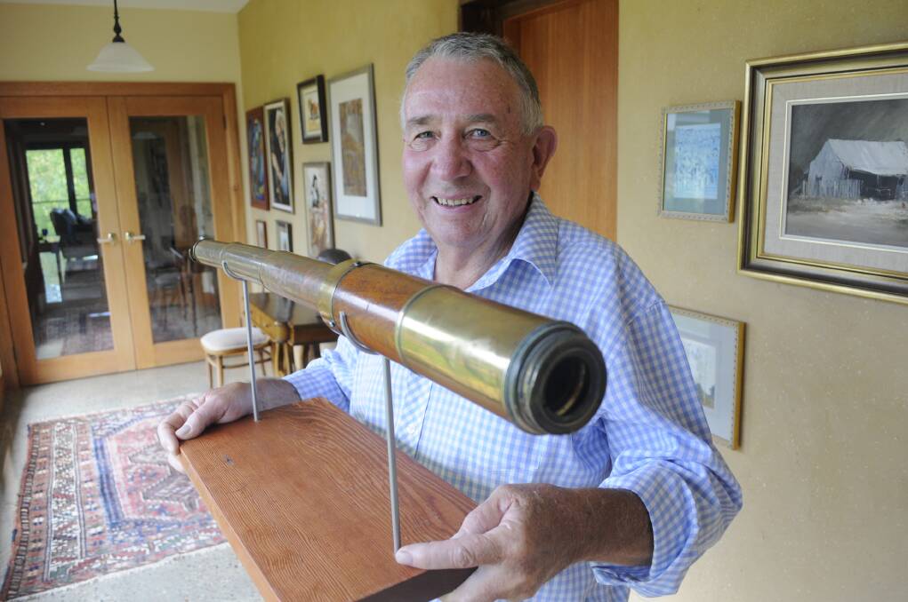 BACK IN BATHURST: Tim Cox with the telescope that belonged to his great-great-great-grandfather Lieutenant William Cox, who built the first road across the Blue Mountains. Photo: CHRIS SEABROOK 	 022415ctelescpe