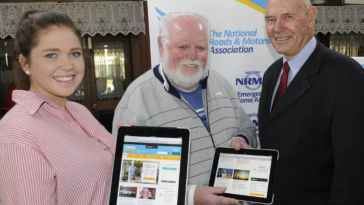 Speaker Lucy Ryan, Tom Hughes and NRMA director Graham Blight at the launch of the Living Well Navigator, held at the Senior Citizens Centre yesterday. Photo: CHRIS SEABROOK 	082614cnrma