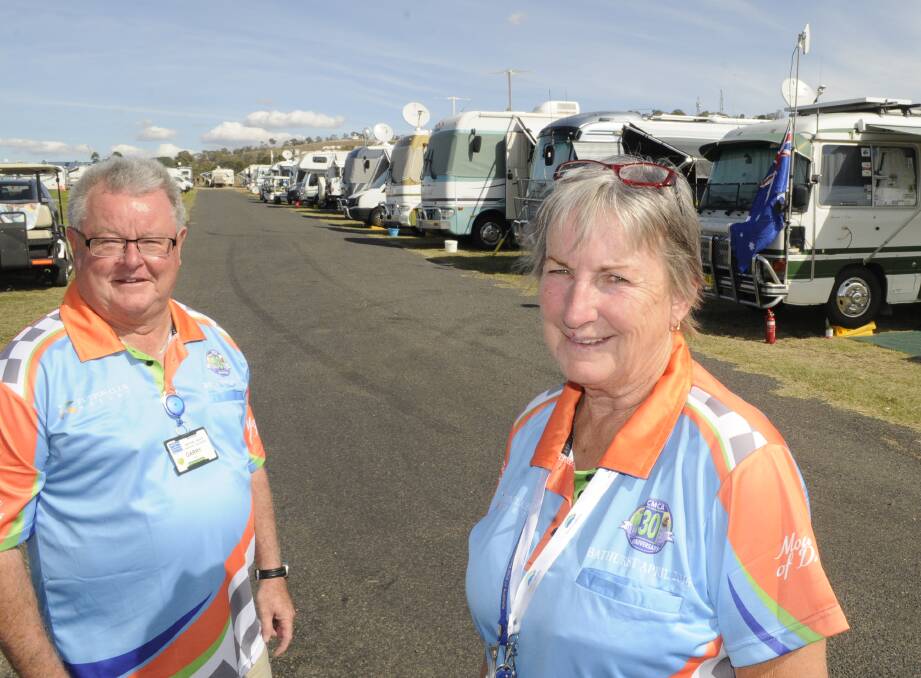 SETTING UP: Campervan and Motorhome Club of Australia chairman Garry Lee and Bathurst Rally manager Colleen Walker are among those helping set up Mount Panorama for the upcoming rally. Photo: CHRIS SEABROOK 	042016cmca1