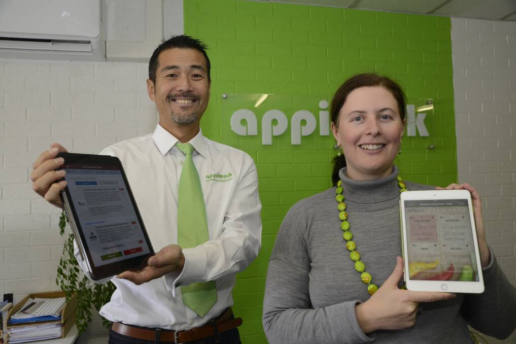 WINNERS: Appiwork’s Isao and Zoe Hida are proud to have received awards at the 2016 World App Design Awards. Photo: PHILL MURRAY 	051816pappi