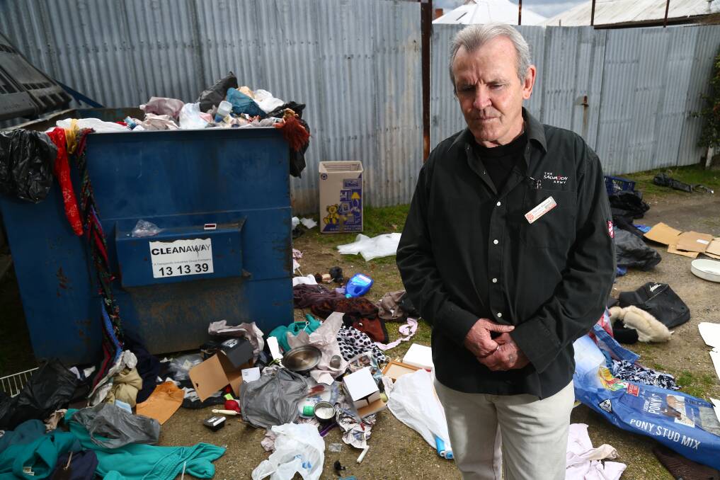 CLEAN UP: Salvation Army Family Store manager Steve Barrott with the big mess outside the Bathurst charity store yesterday. Photo: PHIL BLATCH 	082715pbsalvos1