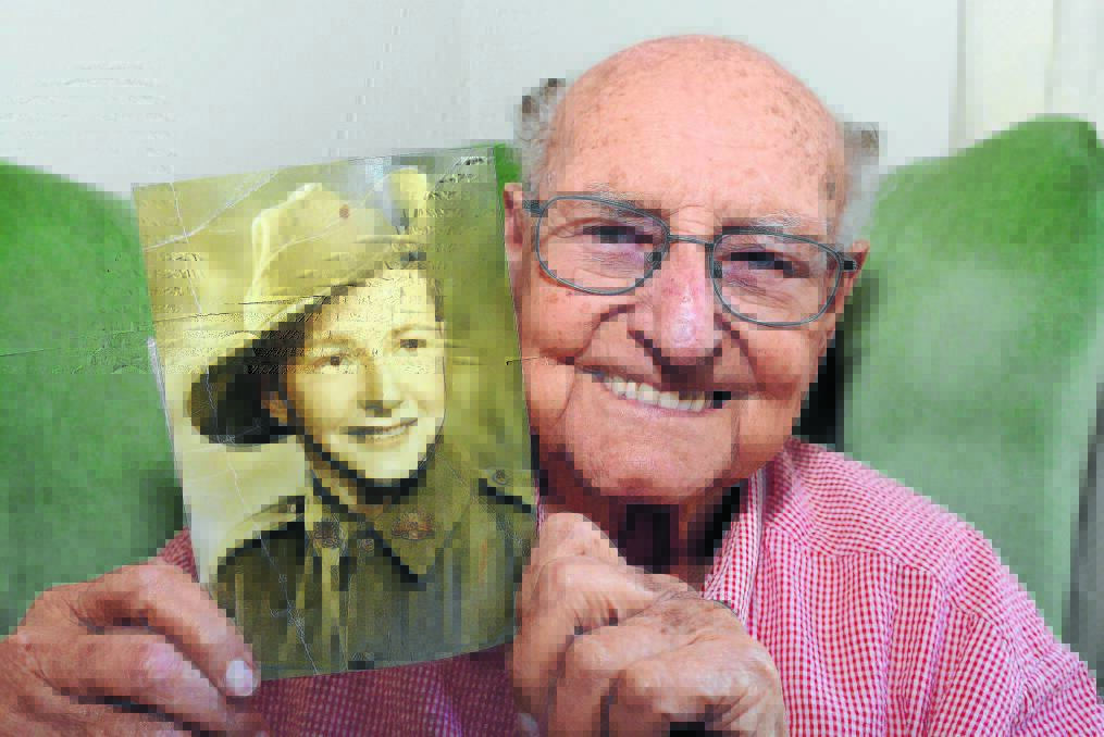 RECOLLECTIONS: As a trainee soldier, Private Max Perry was just a young man when he was faced with the horror of the breakout from the Japanese POW camp near Cowra. Photo: PHILL MURRAY 041714pmax