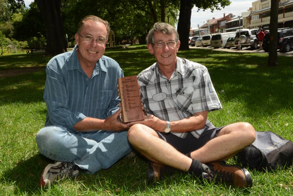 GREEN HELPERS: Wayne Freebrey and Hugh Gould of Greening Bathurst with the Jo Ross memorial trophy which will be awarded on Australia Day. Photo: PHILL MURRAY	121614pjo