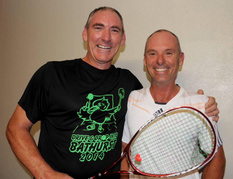 THE ONE TO BEAT: Last year's Bathurst Masters Squash winner Jeff Bond (left) won’t be back to defend his division one title but the man he defeated in the final, Tony Whackett (right), is returning. Photo: ZENIO LAPKA 041314zsquash1